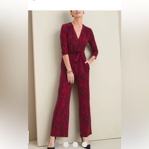 Chico’s jumpsuit size 1 red animal print tie waist.